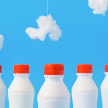 Few Bottles of Milk with sky as background